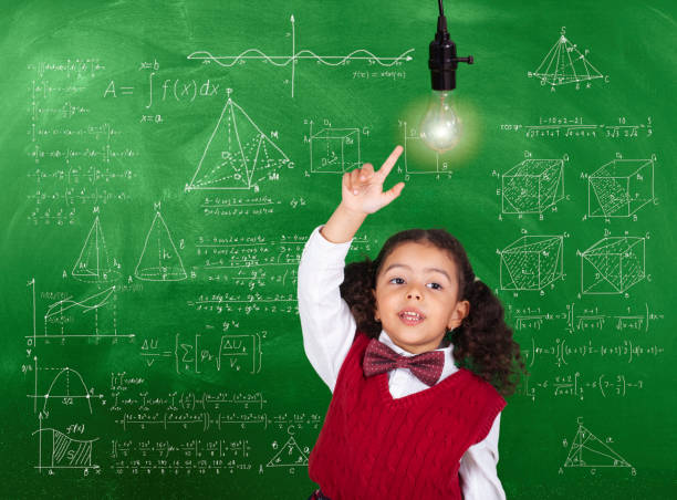 istock African-American schoolgirl has idea under light bulb in class 1268084791