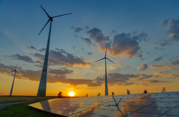 istock renewable energy: wind turbines and modern solar panels (HDRi) 1268084896