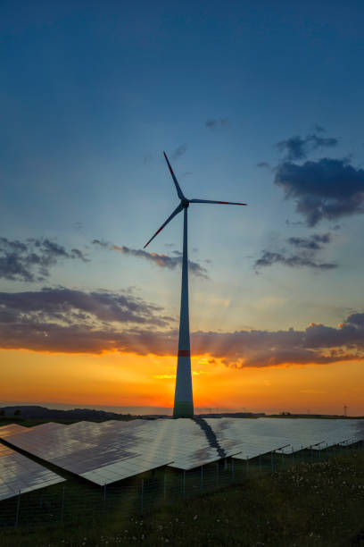 istock renewable energy: wind turbines and modern solar panels (HDRi) 1268084897