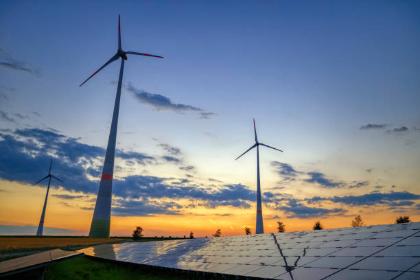 istock renewable energy: wind turbines and modern solar panels (HDRi) 1268084904