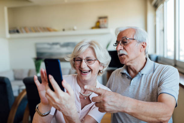 istock Cheerful senior couple taking a selfie 1268086657
