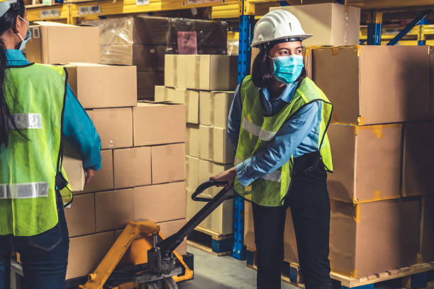 istock Factory industry worker working with face mask to prevent Covid-19 1268089526