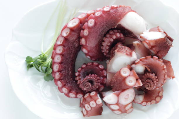istock chopped octopus on dish for Japanese sashimi 1268090940