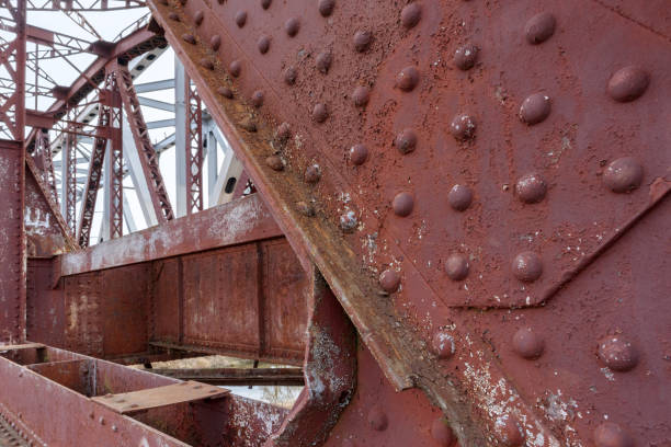 istock Rusty old steel construction of bridge. 1268110861