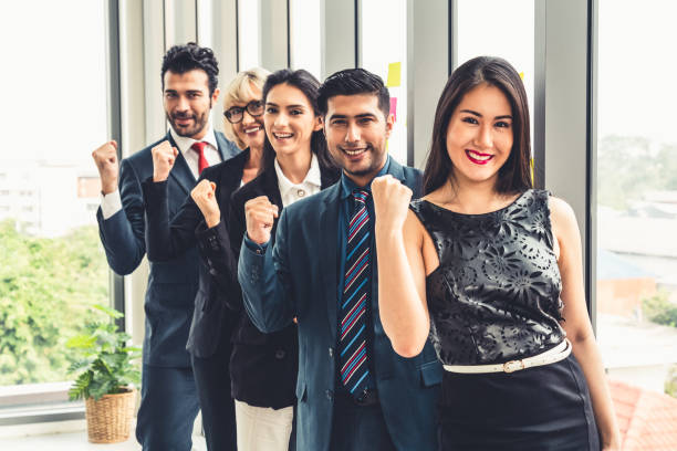 istock Successful business people standing together 1268110951