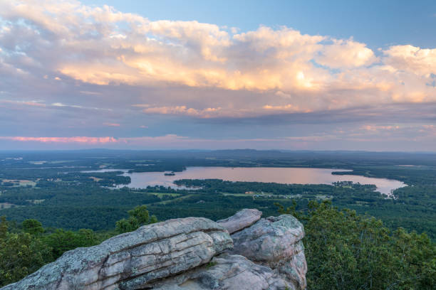 istock Sunlit Clouds over Rural Alabama Lake 1268111004