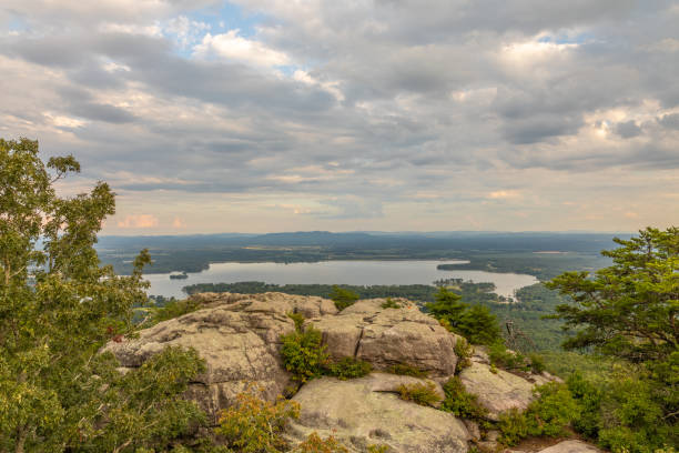 istock Alabama Rock Outcrops and Rural Lake 1268111133