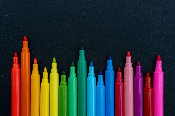 Photo of Open multicolored markers.