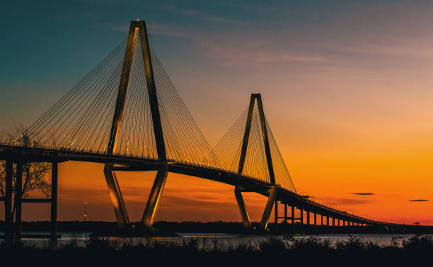 istock Cooper River Bridge at night in South Carolina 1268125432