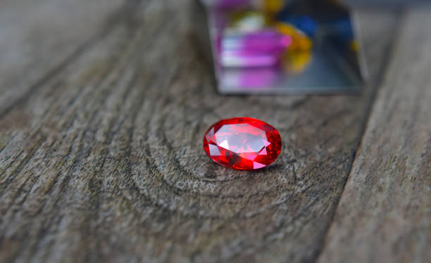 istock An oval red gemstone is placed on the floor for jewelry making. 1268126294