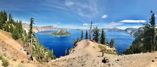istock crater lake national park with wizard island - super wide angle panoramic 1268128366
