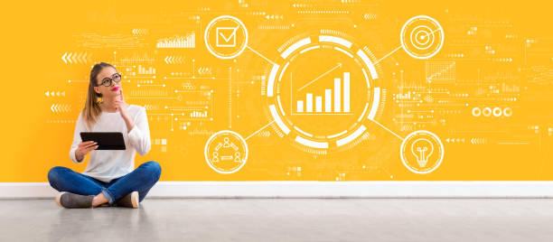 istock Marketing concept with woman using a tablet 1268128588