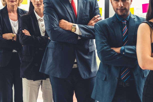 istock Successful business people standing together 1268132504