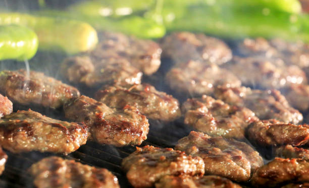 istock Turkish style home made meatballs grilled in iron pan 1268135593