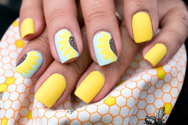 Yellow Sunflower Nail Art Design Summer Inspired Art yellow nail polish stock pictures, royalty-free photos & images