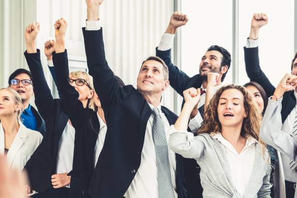 istock Successful business people standing together 1268137255