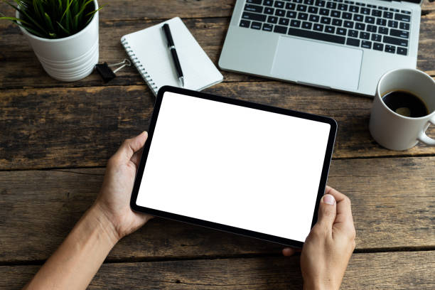 istock Mockup image tablet, man hand holding tablet pc with blank white screen 1268137330