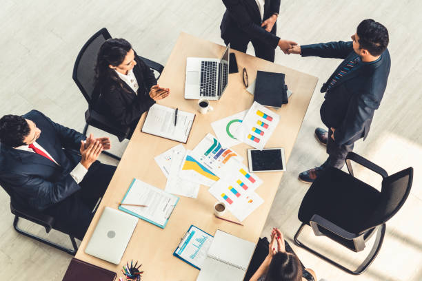 istock Business people group meeting shot from top view 1268142874