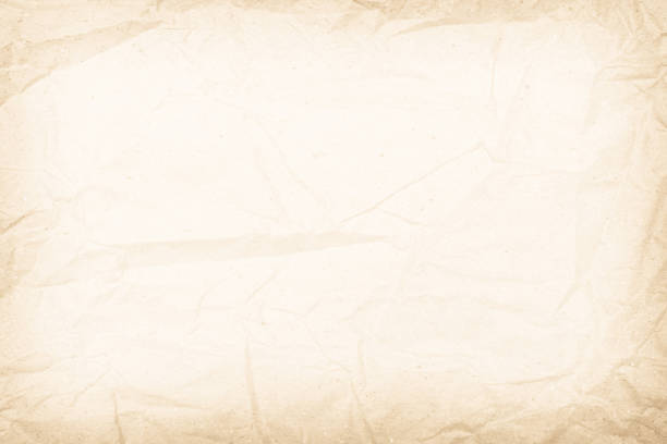 istock White recycled craft paper texture as background. Grey paper texture, Old vintage page or grunge vignette of old newspaper. Pattern rough art creased grunge letter. Hardboard with copy space for text. 1268142876