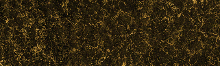 Abstract golden and black marble stone texture for background or luxurious tiles floor and wallpaper decorative design.