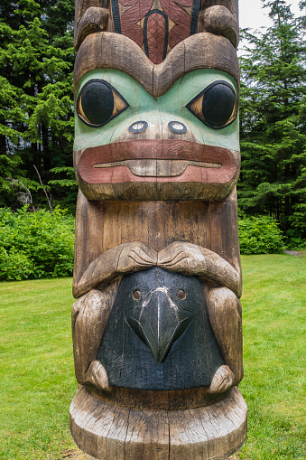 Mosquito Legend totem pole at the Sitka National Historic Park on the  Totem Trail. Sitka Alaska.