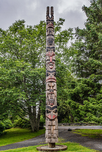 Yaadaas Crest totem pole at the Sitka National Historic Park on the  Totem Trail. Sitka Alaska.