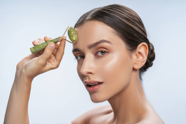 istock Relaxed young Caucasian woman massaging her forehead 1268148980