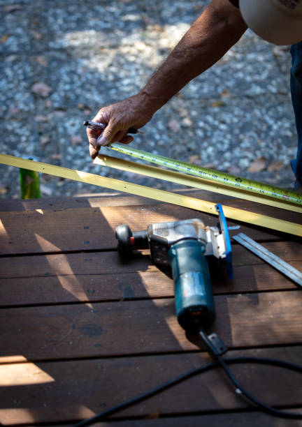 istock Carpenter measuring metal threshold for cutting 1268153495