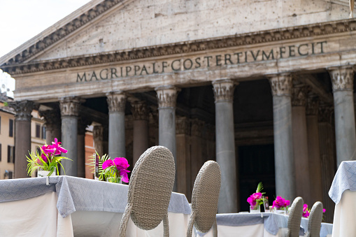 tables set with flowers in front of the pantheon