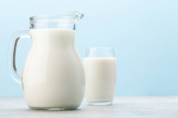 istock Milk jug and glass 1268162458
