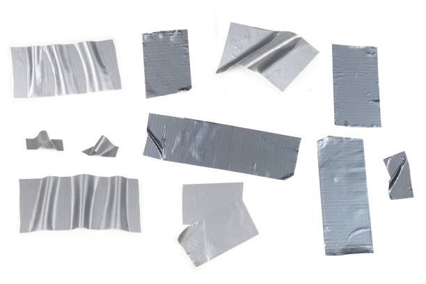 istock Silver scotch tape pieces isolated on white background. 1268163851