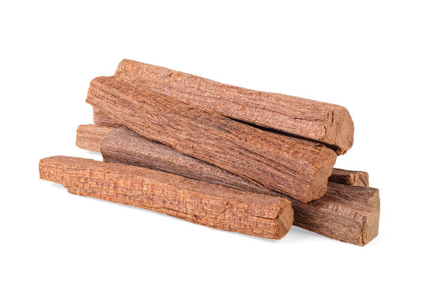Sandalwood sticks isolated on a white background. Chandan or sandalwood. Sandalwood sticks isolated on a white background. Chandan or sandalwood. sandalwood stock pictures, royalty-free photos & images