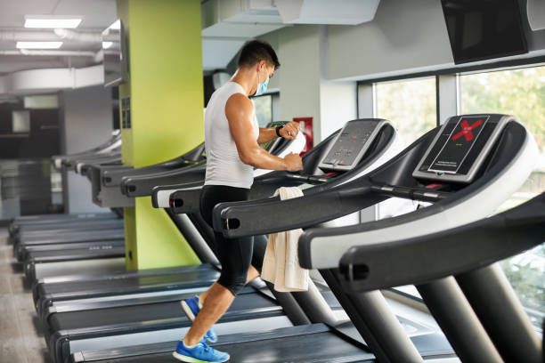 istock Young Man Exercising In Gym After Coronavirus Pandemic 1268178623
