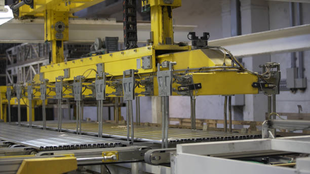 istock Modern robotic Aluminium extrusion production line factory warehouse. Plastic windows manufacture. 1268181186