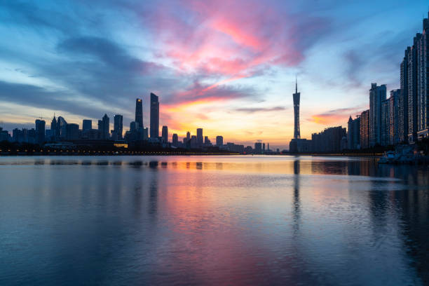istock Guangzhou city skyline at sunrise 1268183101
