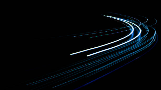 istock abstract blue car lights at night 1268185490