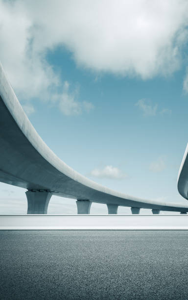 istock Clear sky, highway pavement under the overpass 1268185516