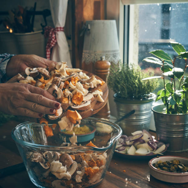 istock Preparing Vegetarian Stuffed Pumpkins with Mushroom Strofanoff 1268186174
