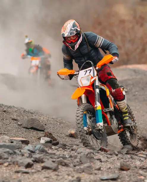 Photo of motocross bike race speed and power in extreme man sport ,sport action concept