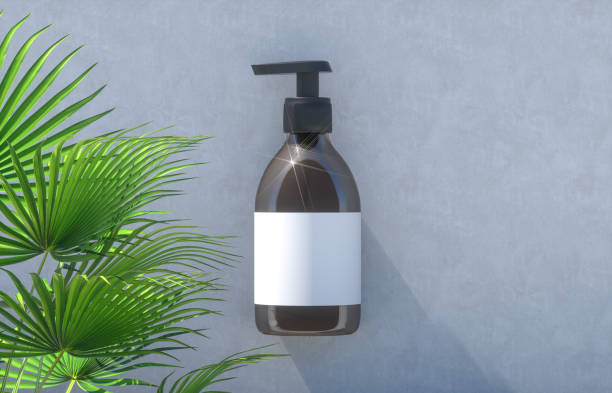 istock Natural cosmetic blank bottle container with tropical palm leaves background. 1268191911