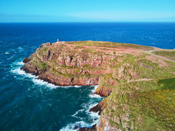 Scenic view of Cape Frehel, one of the most popular tourist destinations in Brittany, France Scenic view of Cape Frehel, one of the most popular tourist destinations in Brittany, France. Aerial drone view of widely known tourist attraction along famous GR34 tracking path frehal photos stock pictures, royalty-free photos & images