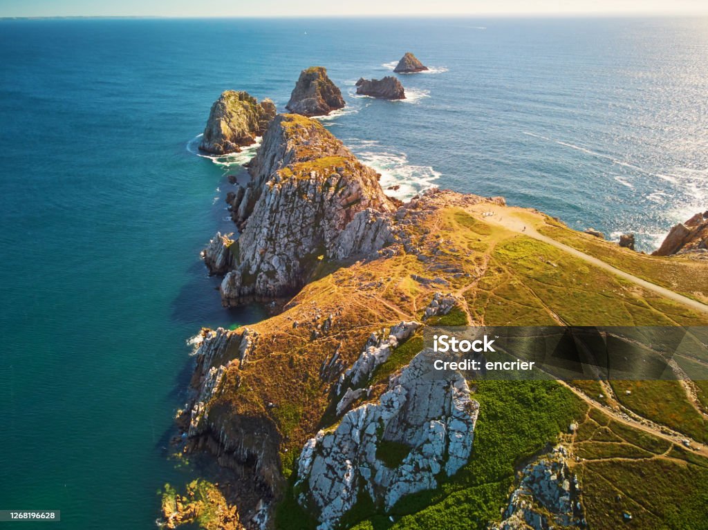 Scenic view of Crozon peninsula, one of the most popular tourist destinations in Brittany, France Scenic view of Crozon peninsula, one of the most popular tourist destinations in Brittany, France. Aerial drone view of widely known tourist attraction along famous GR34 tracking path Brittany - France Stock Photo