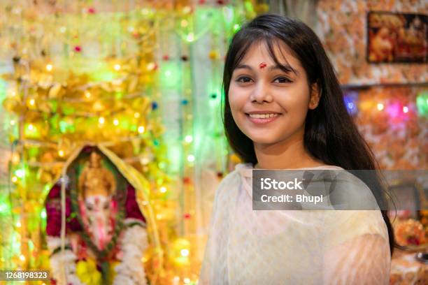Happy Indian Girl Celebrating Ganesh Chaturthi Festival Stock Photo - Download Image Now