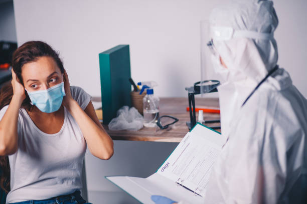 istock Doctor And Patient At Ambulance 1268200609