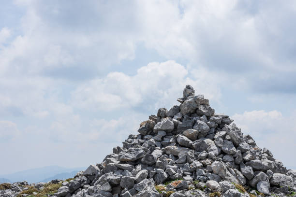 istock pile of stones on a summit on a mountain 1268200632