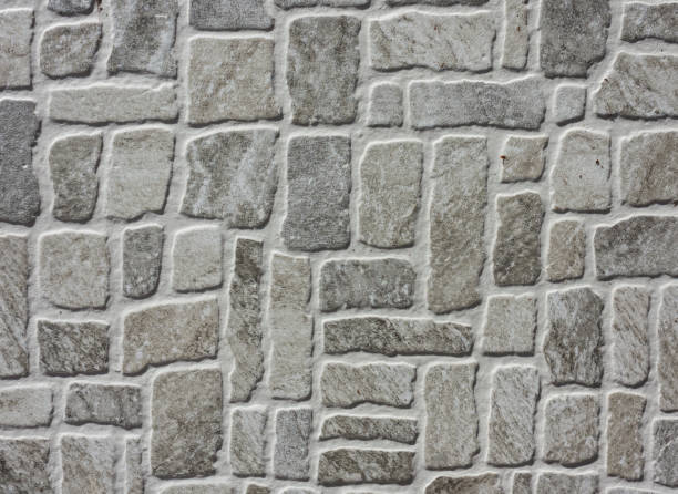 istock texture of a stone wall of an old building, ancient architecture. 1268201916