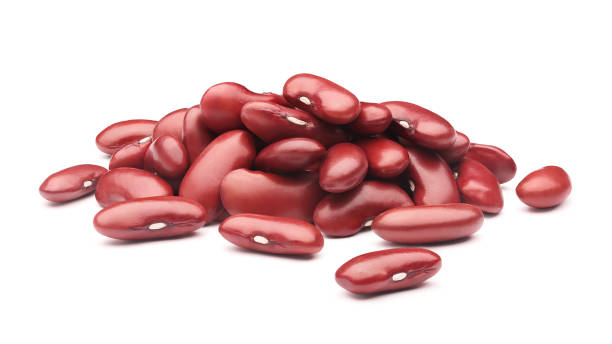 Pile of red kidney beans isolated on white background - clipping path included Pile of red kidney beans isolated on white background - clipping path included kidney bean stock pictures, royalty-free photos & images