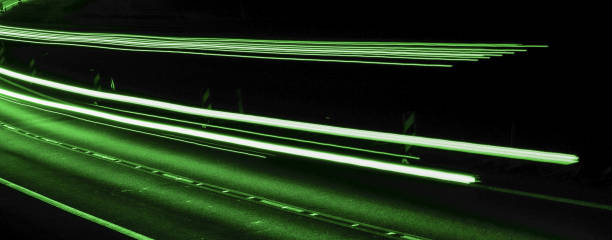istock abstract green car lights at night 1268204916