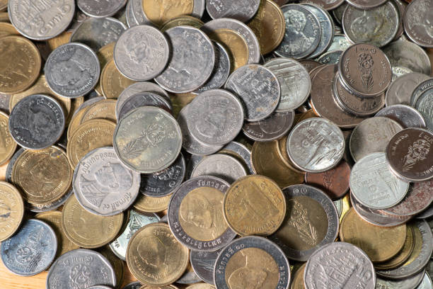 istock business and saving concept. coin on top wood table. 1268208083