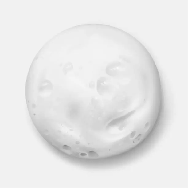 Vector illustration of White foam texture from soap, shampoo or cleanser realistic vector illustration, top view. Shaving foam round spot